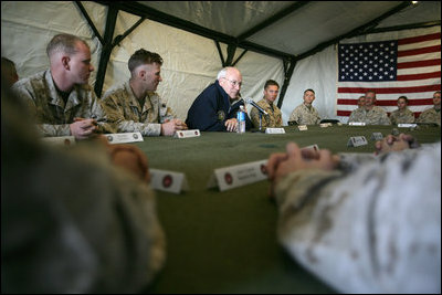 Vice President Dick Cheney holds a group discussion at AL-Asad Airbase in Iraq, Sunday Dec. 18, 2005.