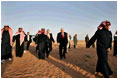 Vice President Dick Cheney and King Abdullah make their way through Saudi sands on the way to the King's desert camp outside Riyadh, Tuesday January 17, 2006.