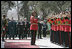 Vice President Dick Cheney is joined by President Hamid Karzai of Afghanistan for the playing of the national anthem of the United States Thursday, March 20, 2008, during an arrival ceremony at Gul Khana Palace in Kabul. While in Afghanistan the Vice President held meetings with President Karzai and visited Bagram Air Base for a classified briefing and dinner with U.S. troops.