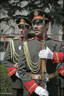 Members of an Afghanistan military honor guard sing their national anthem Thursday, March 20, 2008 during a ceremony in honor of the arrival of Vice President Dick Cheney. The Vice President’s visit to Kabul comes at a critical time as allied members of NATO consider their future commitments to the young democracy’s development. 