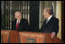 Vice President Dick Cheney looks on as Prime Minister of Israel Ehud Olmert delivers a statement Saturday, March 22, 2008 during a press availability at the prime minister's residence in Jerusalem. The Vice President is scheduled to meet with both Israeli and Palestinian leadership over Easter weekend to discuss President Bush's commitment to a two state solution for Israeli-Palestinian peace.