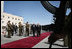 Vice President Dick Cheney and President Mahmoud Abbas of the Palestinian Authority walk through an honor cordon after the arrival Sunday, March 23, 2008, of the vice president to the West Bank city of Ramallah.