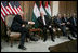 Vice President Dick Cheney and President Mahmoud Abbas of the Palestinian Authority shake hands Sunday, March 23, 2008, during their meeting at the Muqata in Ramallah. 