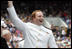 A graduate celebrates after receiving his diploma from Vice President Dick Cheney during the Graduation and Commissioning Ceremony for the U.S. Naval Academy Class of 2006, Friday, May 26, 2006 in Annapolis, Maryland.