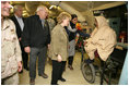 Vice President Cheney and Mrs. Lynne Cheney visit the 212th M.A.S.H.(Mobile Army Surgical Hospital) Unit run by the U.S. military in a mountainous area near the earthquake's epicenter, 65 miles northwest of Islamabad, Pakistan, Tuesday Dec. 20, 2005. During the visit the Vice President said he was "impressed with what we've been able to do with our M.A.S.H. units. U.S. forces were able to move quickly into the area. We were here within 48 hours and we've been here ever since."