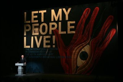 Vice President Dick Cheney addresses an international forum at the Juliusz Slowacki Theatre in Krakow, Poland, Thursday, Jan. 27, 2005. "The story of the camps reminds us that evil is real, and must be called by its name, and must be confronted." said the Vice President,"We are reminded that anti-Semitism may begin with words, but rarely stops with words ... and the message of intolerance and hatred must be opposed before it turns into acts of horror." 