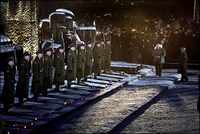 Vice President Dick Cheney walks to place a candle on a memorial tablet in the former Nazi concentration camp of Auschwitz-Birkenau in Oswiecim, Poland, Thursday, Jan. 27, 2005. Vice President Cheney attend a number of ceremonies throughout the day, commemorating the 60th Anniversary of the Liberation of the Auschwitz-Birkenau Concentration Camp.