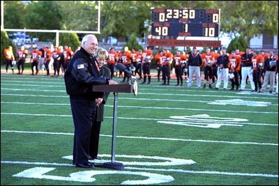 Standing in the stadium where he once played football, Vice President Dick Cheney delivers remarks to a hometown crowd at the Cheney Alumni Field dedication ceremony in Casper, Wyo., Sept. 20, 2002. 