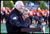 Standing in the stadium where he once played football, Vice President Dick Cheney delivers remarks to a hometown crowd at the Cheney Alumni Field dedication ceremony in Casper, Wyo., Sept. 20, 2002. 