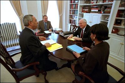 Vice President Dick Cheney attends a meeting with National Security Advisor Dr. Condoleezza Rice (right), Secretary of Defense Donald Rumsfeld (middle left) and Secretary of State Colin Powell (left) in Dr. Rice's office.