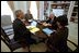 Vice President Dick Cheney attends a meeting with National Security Advisor Dr. Condoleezza Rice (right), Secretary of Defense Donald Rumsfeld (middle left) and Secretary of State Colin Powell (left) in Dr. Rice's office.