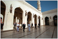 During his visit to Muscat, Oman, Vice President Dick Cheney passes under pointed arches and ornate engravings during a tour of the country's massive Grand Mosque, which spans an area of about 25 square miles, March 16.