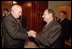 Prime Minister Bulent Ecevit of Turkey welcomes Vice President Dick Cheney to a working dinner in Ankara, Turkey, March 19, 2002.