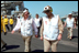 Talking with pilots on mission in Afghanistan, Vice President Dick Cheney tours the USS Stennis Aircraft Carrier March 15, 2002.