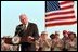 Discussing American initiatives in the war, Vice President Dick Cheney speaks to troops stationed at Al-Udeid Airbase in Qatar, March 17, 2002. 