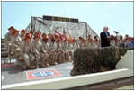 Vice President Dick Cheney addresses the Arkansas National Guard Troops in Sharm El-Sheikh, Egypt, March 13. "You, and everyone around you, are doing your duty and reflecting credit on yourselves, your families, and your country," said the Vice President during a speech at the Airbase. "You're here because you believe in America, and America believes in you."