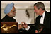 President George W. Bush and India's Prime Minister Dr. Manmohan Singh toast the evening in honor of Singh's visit, at the official dinner in the State Dining Room, Monday evening, July 18, 2005, at the White House. White House photo by Carolyn Drake