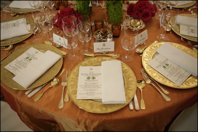 The table setting for President Bush is seen prior to the start of the official dinner, Monday, July 18, 2005 at the White House, in honor of the visit by India's Prime Minister Dr. Manmohan Singh. White House photo by Eric Draper