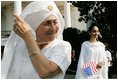 Guests attending the official arrival of India's Prime Minister Dr. Manmohan Singh, are seen Monday, July 18, 2005, on the South Lawn of the White House. 