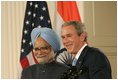 President George W. Bush and India's Prime Minister Dr. Manmohan Singh, appear before reporters during a joint news conference, Monday, July 18, 2005, in the East Room of the White House. 