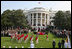 The U.S. Army Old Guard Fife and Drum Corps marches across the South Lawn during the official arrival ceremony for Prime Minister Junichiro Koizumi of Japan Thursday, June 29, 2006.