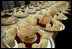 Trays of sweet rose blossoms are prepared for guests during the State Dinner for her Majesty Queen Elizabeth II of Great Britain and His Royal Highness The Prince Philip, Duke of Edinburgh, Monday, May 7, 2007. White House photo by Shealah Craighead