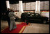 President George W. Bush and Mrs. Laura Bush wave as Her Majesty Queen Elizabeth II and His Royal Highness The Prince Philip, Duke of Edinburgh, leave the White House Monday evening, May 7, 2007, at the conclusion of the State Dinner in honor of the Queen's visit to Washington, D.C. White House photo by Eric Draper