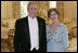 President George W. Bush and Mrs. Laura Bush pose for a photo after viewing the State Dining Room prior to welcoming Her Majesty Queen Elizabeth II and His Royal Highness The Prince Philip, Duke of Edinburgh, Monday, May 7, 2007, to the White House for a State Dinner in the Queen’s honor. White House photo by Eric Draper