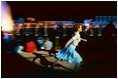 Performers Ryan Kelley and Rebecca Shezman rehearse a televised routine for the National Memorial Day Concert, filmed by Capital Concerts, Inc., for the Public Broadcasting Service (PBS). The pair dance near the Rainbow Pool at Memorial.