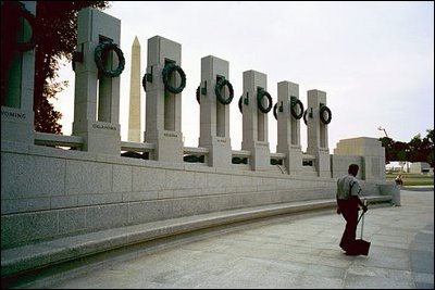 Ray Gresham, supervisor of the National Park Service.s Memorial Maintenance Crew, takes an early morning survey along the plaza encircled by 56 granite pillars. The new memorial is one of many sites that are maintained by Gresham.s crew, which cleans the National Park Service.s monuments and memorials every morning before tourists arrive.