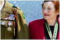 A veteran of the Battle of the Bulge and the Army Nurse Corps, Dorothy S. Davis of Kensington, Md., visits the memorial with fellow veterans. 