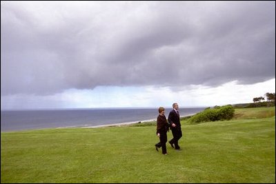 President and Laura Bush mark the memory of America and the Allied Forces' D-Day Invasion during a visit to Omaha Beach at Normandy, France, May 27, 2002. More than 5,000 ships and 12,000 planes carried troops across the English Channel into battle in which the Allied Forces suffered more than 9,000 casualties. The victory in this epic battle was the key to the Allies' victory in the war.