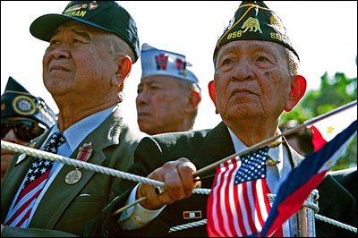 World War II Filipino-American veterans attend the State Arrival Ceremony for President Gloria Macapagal-Arroyo of the Philippines on the South Lawn May 19, 2003. Presidents Bush and Arroyo in a joint statement reviewed with pride the contributions made by Philippine World War II veterans who gave so much in defense of freedom. 