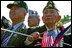 World War II Filipino-American veterans attend the State Arrival Ceremony for President Gloria Macapagal-Arroyo of the Philippines on the South Lawn May 19, 2003. Presidents Bush and Arroyo in a joint statement reviewed with pride the contributions made by Philippine World War II veterans who gave so much in defense of freedom. 